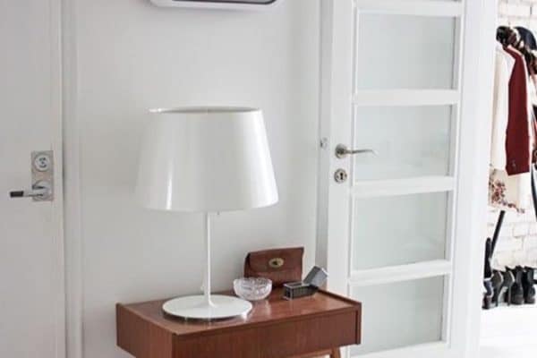 How lovely does this mid century teak console table look with all the white and we love that clock. Flap @habitatuk