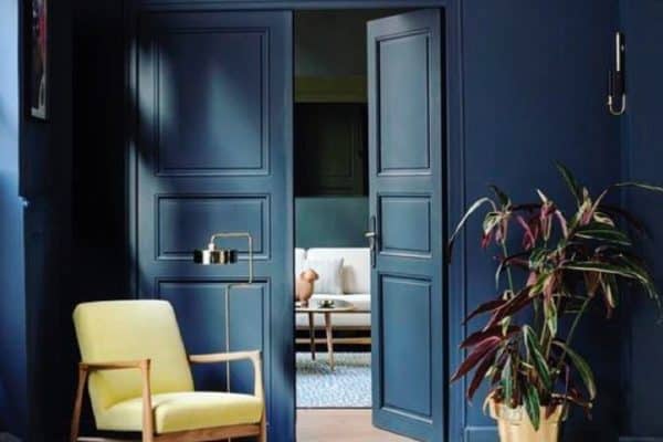 I love it when woodwork is painted the same colour as the walls. These doors look fantastic. The dark walls make everything with colour stand proud. Love the rug too! ?woodworkslab