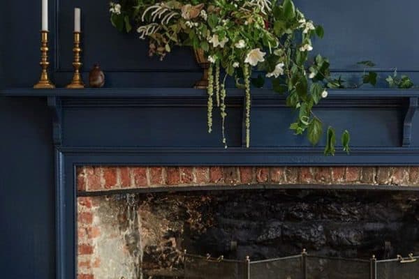 A fireplace painted onto the wall can have an amazing effect. If my house was of the right age to suit a fireplace like this, this is what I'd do! 

Pic via Farrow&Ball