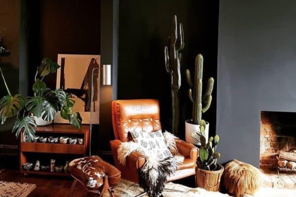 Boho Mexican style lounge. The dark walls create so much atmosphere. Love the fleeces and cacti mix! 

Pic via Kate Watson-Smyth